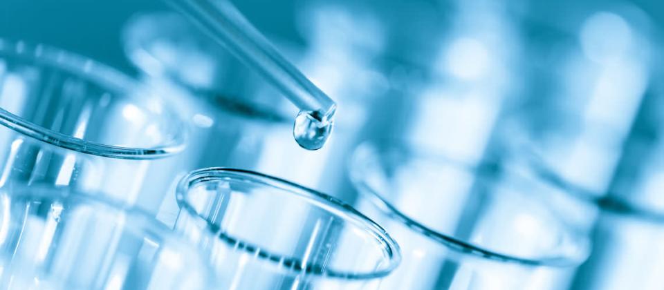 Pipette dropping liquid into test tubes — laboratory instruments market